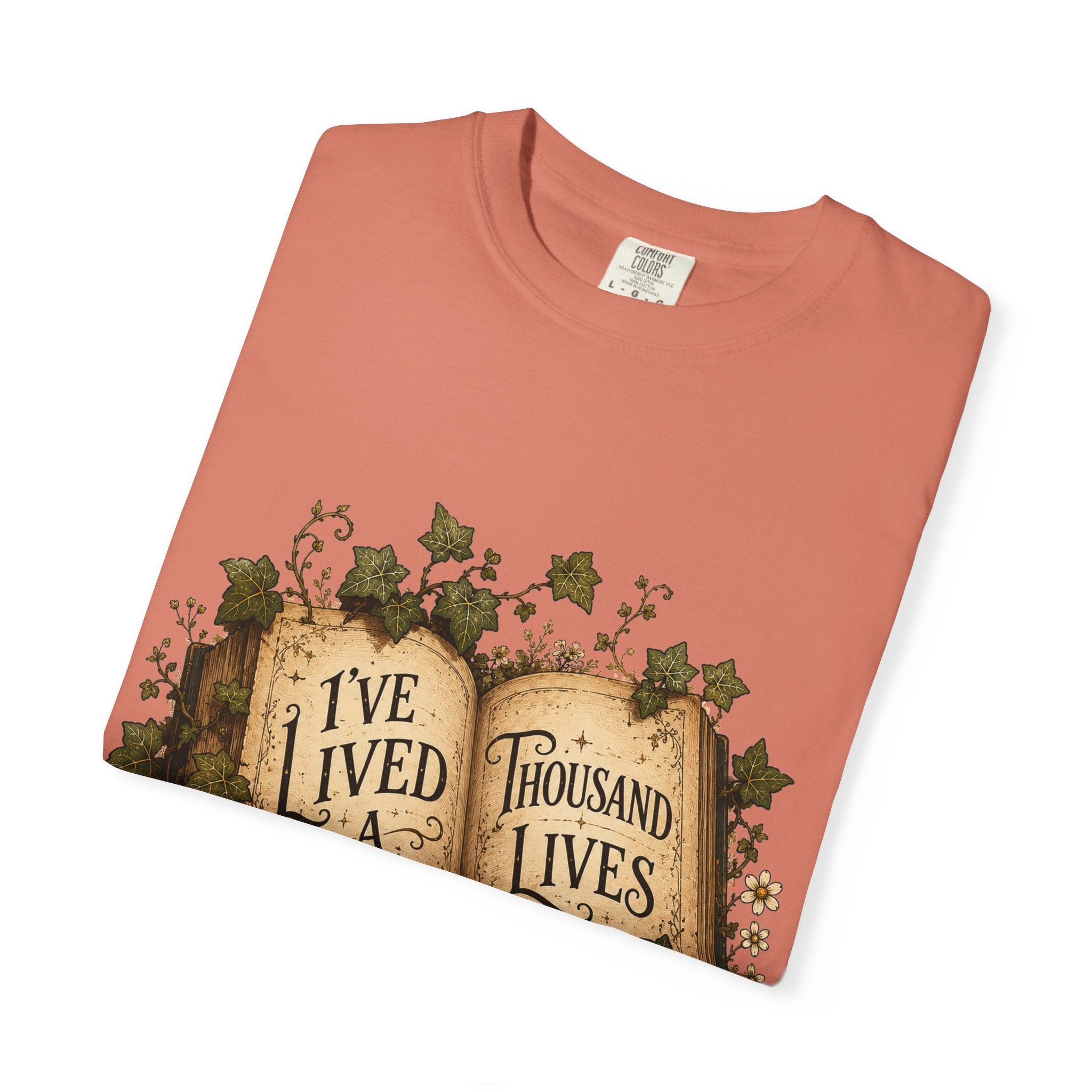 Book Lover T-Shirt — "I've Lived A Thousand Lives" Vintage Open Book Design