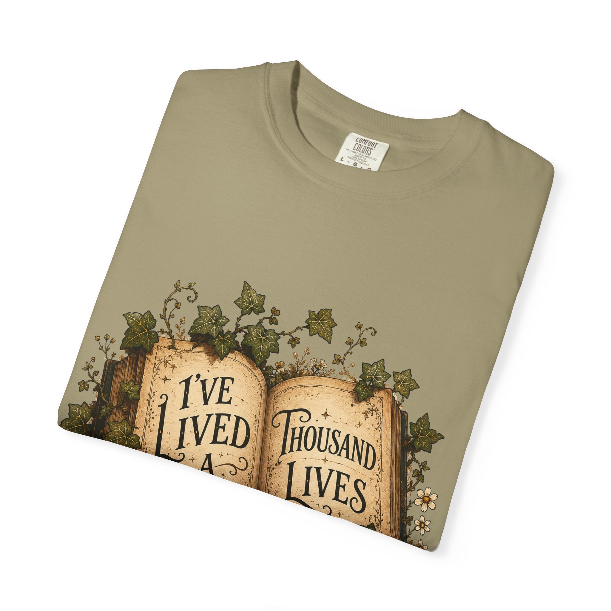 Book Lover T-Shirt — "I've Lived A Thousand Lives" Vintage Open Book Design