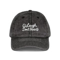 Vintage Red Embroidered Cap – “Laugh Don’t Panic” Smiley Dad Hat