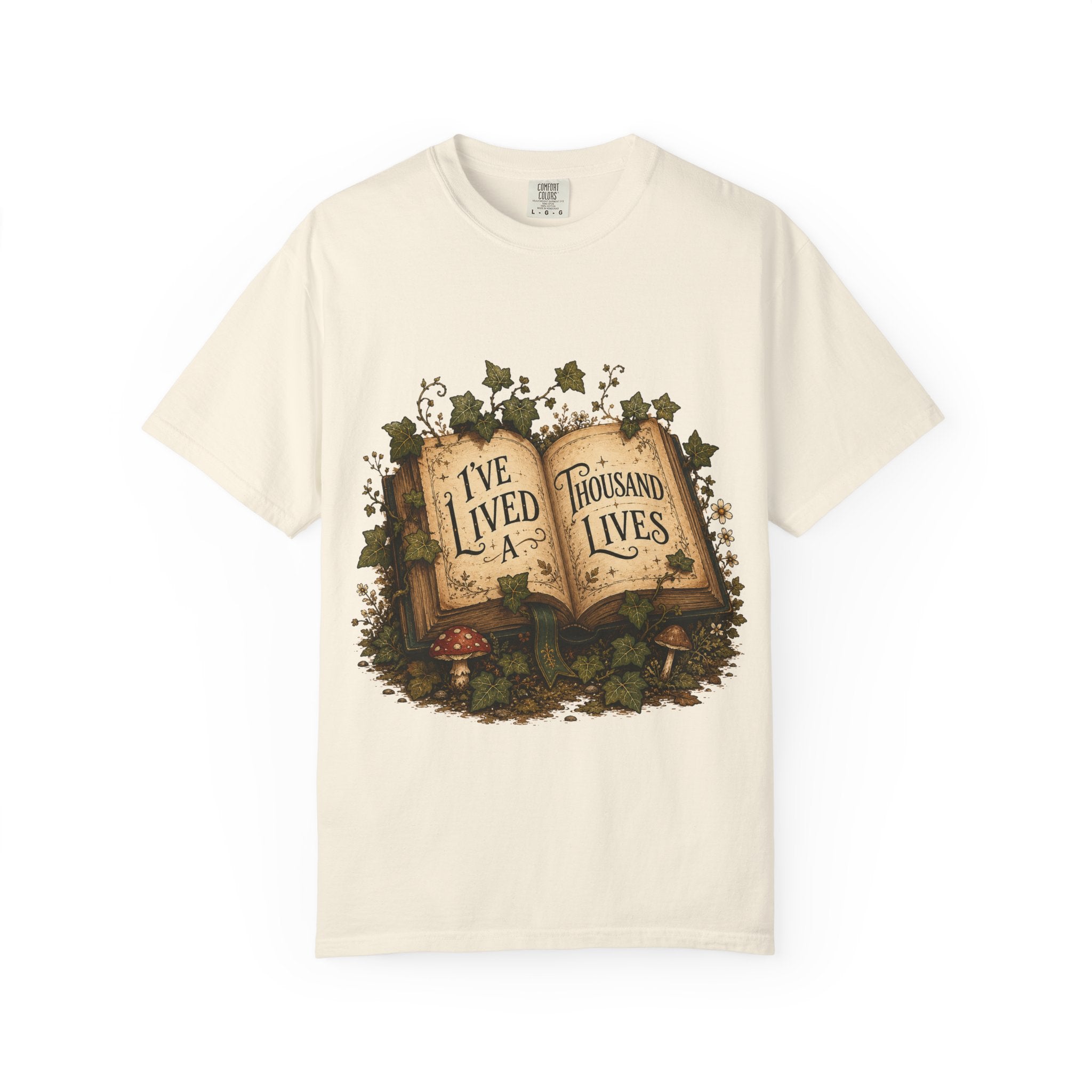 Book Lover T-Shirt — "I've Lived A Thousand Lives" Vintage Open Book Design